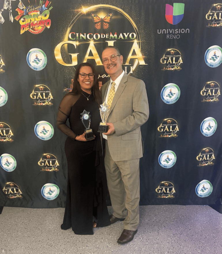 Felipe and Caronlina - Owners of Jacks Coffee Shop posing with their award in 2025