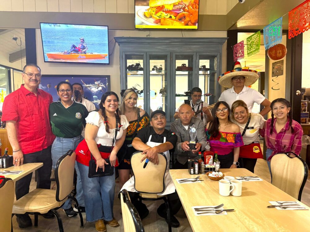 The team at Jacks coffee shop on wells posing for a Cinco de Mayo picture